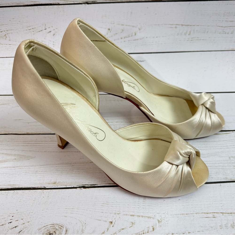 Ivory peep toe silk wedding type shoes